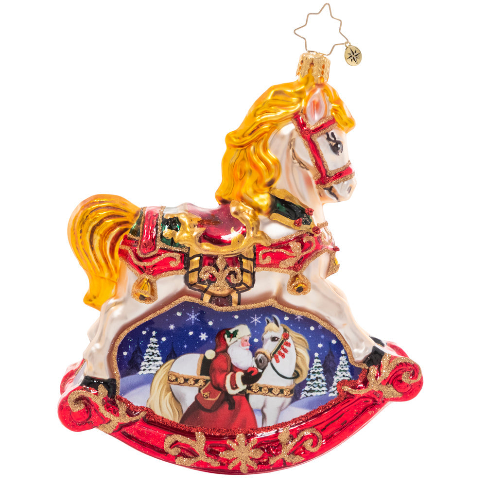 Back - Ornament Description - Resplendent Rocking Horse: Shining in holiday colors of rich red, bright gold, emerald green and midnight blue, this ornate rocking horse embodies timeless Christmas tradition. The wintry vignette beneath reveals a sweet moment between Santa and his noble steed. 