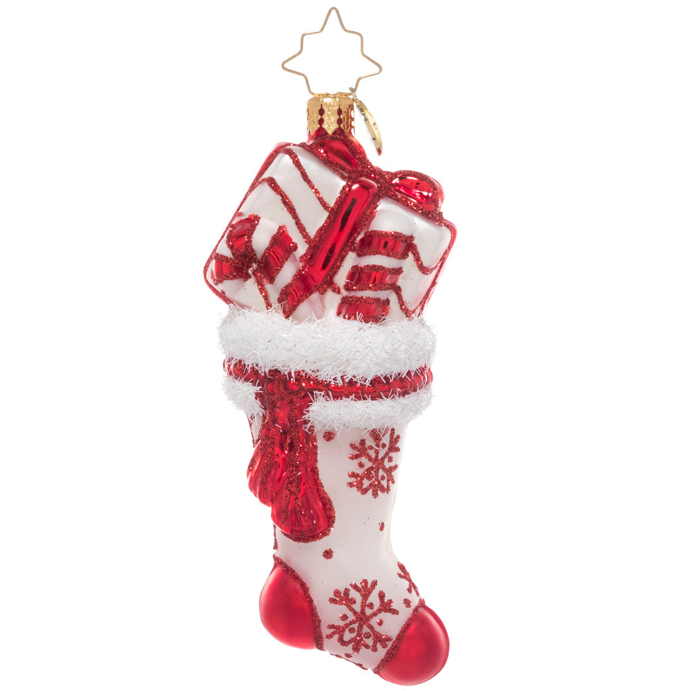 Ornament Description - Peppermint Swirl Stocking: This glittering red & white stocking is stuffed full of sweet surprises! Peppermint swirls, lollipops and candy canes make it an extra special treat. Wonder what other fun things might be inside?