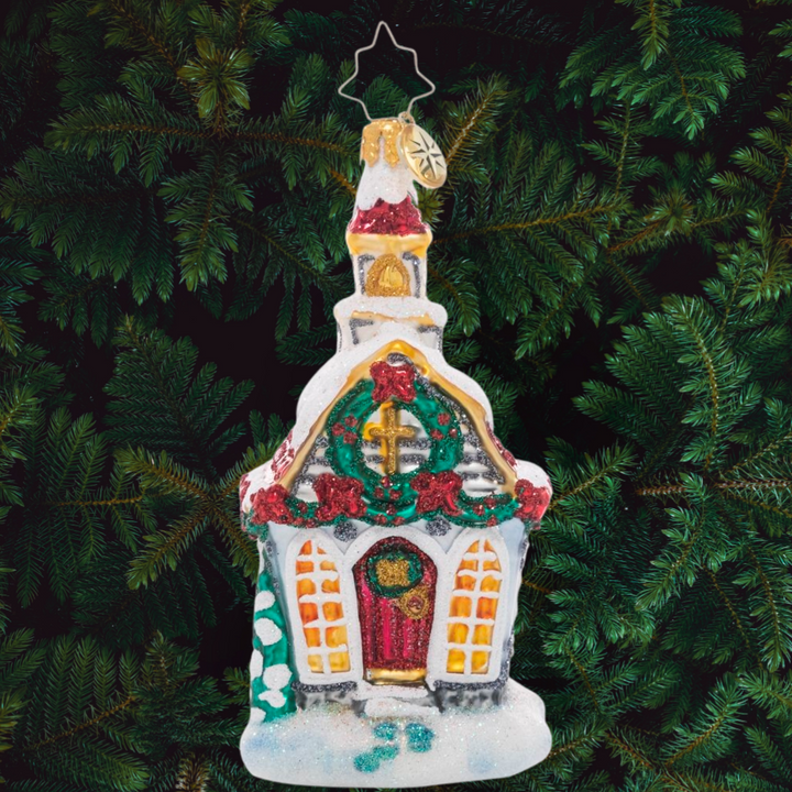 Ornament Description - Christmas Tradition Chapel: Decorated for Christmas and covered in fresh snow, this tiny town chapel welcomes one and all home for the holidays. After all, no celebration is complete without family and friends to share it with!