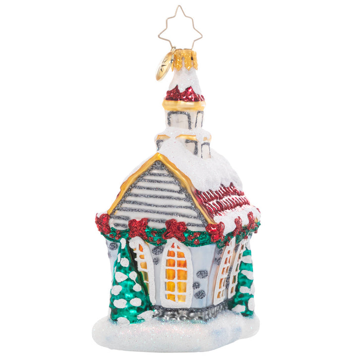 Back - Ornament Description - Christmas Tradition Chapel: Decorated for Christmas and covered in fresh snow, this tiny town chapel welcomes one and all home for the holidays. After all, no celebration is complete without family and friends to share it with!