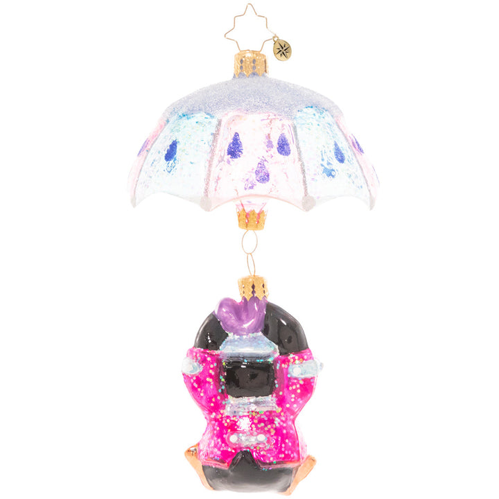 Back - Ornament Description - When It Rains It Pours: Look out below! This adorable penguin pal is drifting in with the snowfall on a pastel parasol.