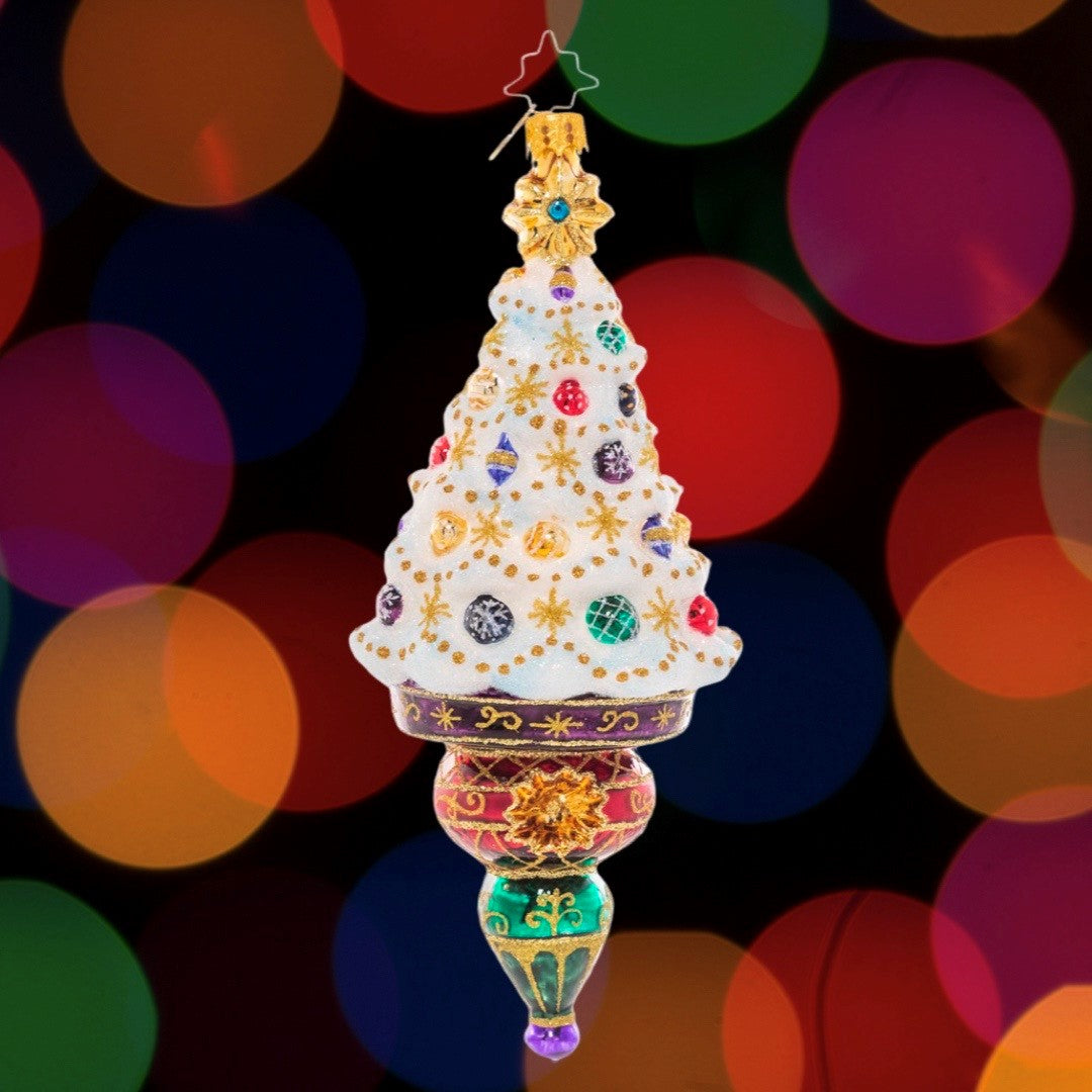 Ornament Description - Christmas Treasures Tree: Treat yourself to a resplendent white Christmas with this ornate tree icicle ornament! Detailed with gold filigree and jewel-toned ornaments, this snow-white Christmas tree is the perfect pop of luxe sparkle for your collection! This special ornament has been hand-picked by the Radko team to be part of the Limited Edition collection.