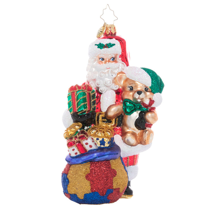 Front - Ornament Design - Delivering Awareness: Santa's sack is packed with presents galore, spreading Christmas cheer and support for a cause close to his heart; Autism awareness. A percentage of the sales from this ornament will benefit a charity that raises Autism awareness.