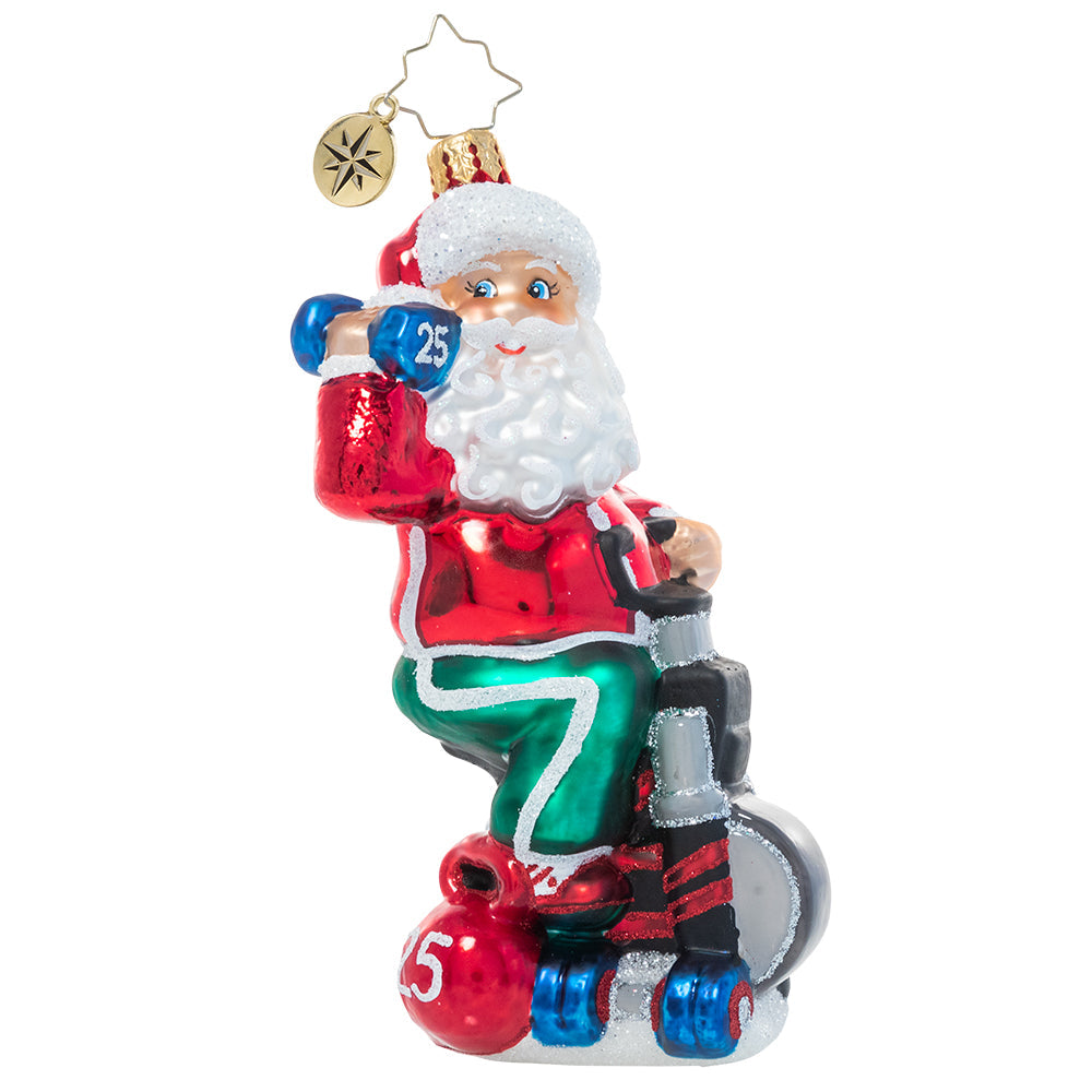 Front - Ornament Description - Santa Breaks a Sweat: Santa's no slouch! He works hard to keep himself in top Christmas shape for the demands of his busiest season; he's got to make room for lots of cookies and milk, after all!