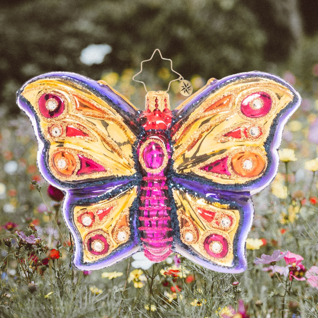 Ornament Description - Wings Of Gold: Floating on gilded wings, this opulent jewel-toned butterfly ornament is as beautiful as it is delicate. Celebrate a unique miracle of nature's beauty with this eye-catching piece!