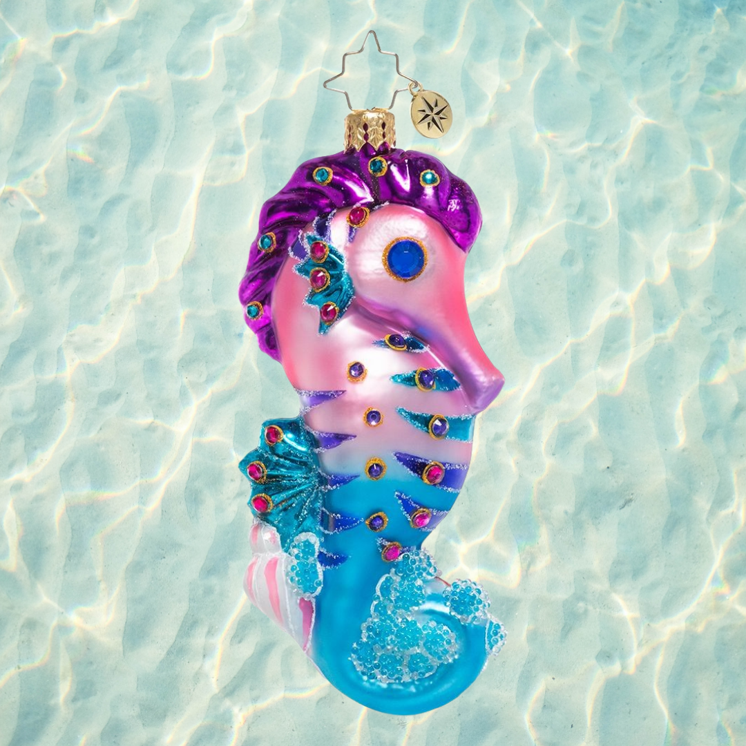 Ornament Description - Jewels of the Sea: Bring the beach home with this colorful and bubbly seahorse ornament! Painted in tropical brights and shimmering glitter accents, this tiny sea creature adds the sparkle of the shore to your Christmas tree.