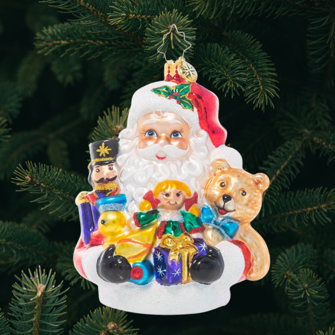 Ornament Description - Armload of Cheer: This old-fashioned Santa has arrived! He smiles brightly with an armload of traditional cheer for good little boys and girls.