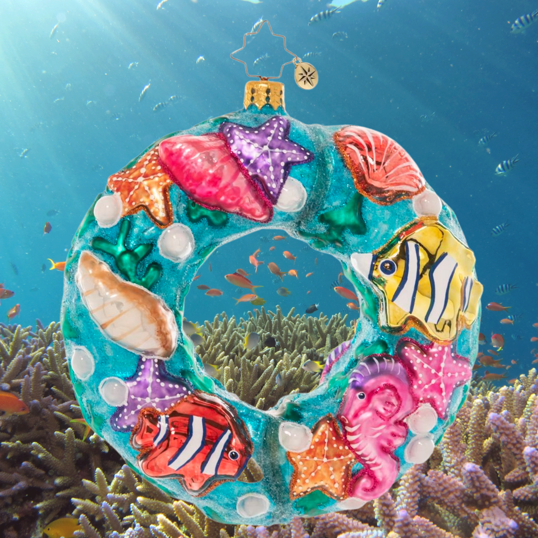 Ornament Description - Under The Sea Wreath: A coral reef comes alive with this ocean-themed wreath ornament! Brightly colored fish, starfish and seashells swirl together to remind us of the unique beauty of the tropical seas.