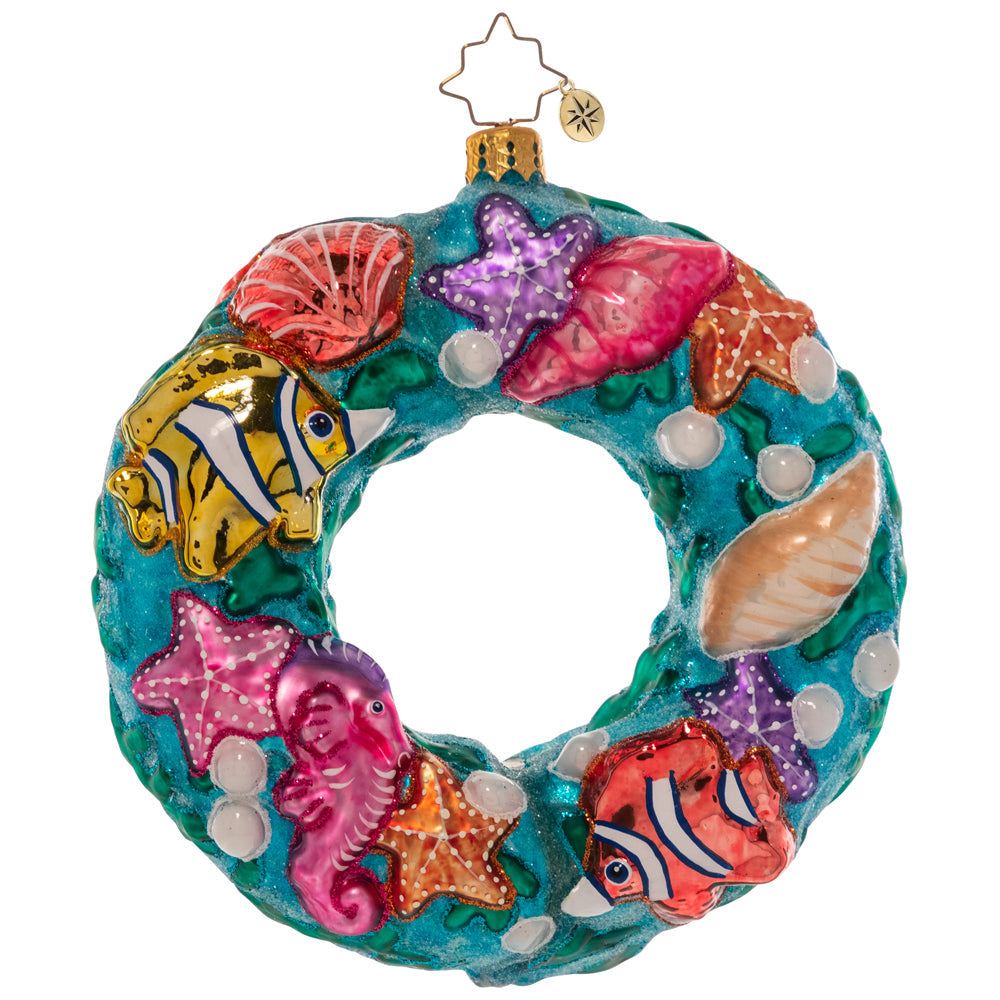 Back - Ornament Description - Under The Sea Wreath: A coral reef comes alive with this ocean-themed wreath ornament! Brightly colored fish, starfish and seashells swirl together to remind us of the unique beauty of the tropical seas.