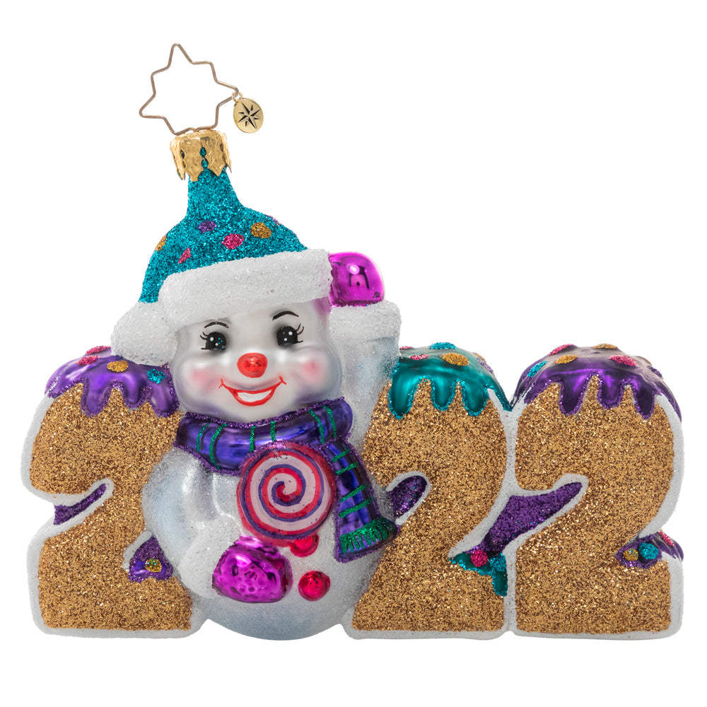 Ornaments - Description: Celebrate 2022 with this jolly ornament featuring a snowman and his candy stash. Here's hoping the year is a tasty treat for us all!