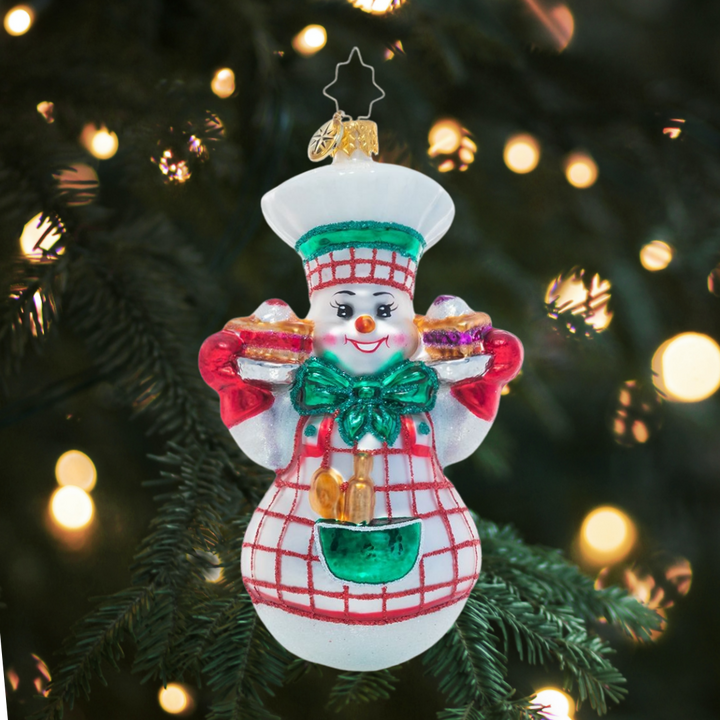 Ornament Description - Jolly Baker Snowman: What's that delicious smell? It's Christmas pie, of course! This baker knows that one of the best parts of the holiday season is the sweet stuff – and sharing it with those we love!