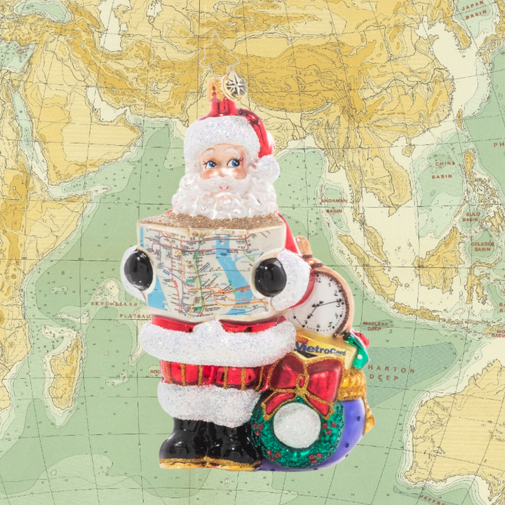 Ornament Description - MTA Saves the Day: Santa has arrived in the Big Apple, but is without his trusty reindeer to guide the way. Luckily he can count on the MTA to help him navigate the city and make sure his special deliveries arrive safely and right on time!