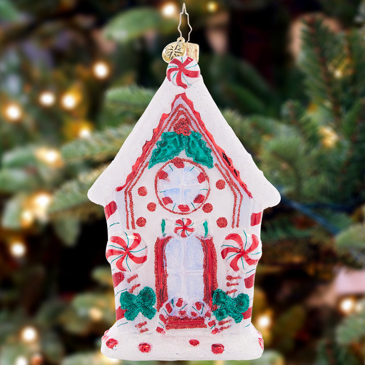 Ornament Description - Candy Cane Chalet: Welcome to Candy Cane Lane! This sweet chalet is a treat to behold, with pepperments and polkadots all over the façade.