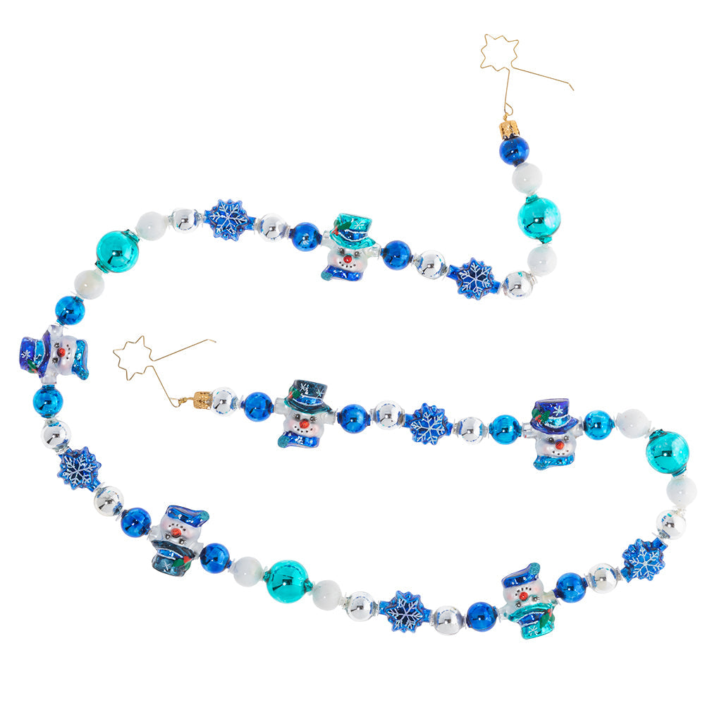 Garland/Trim Description - Smiling Snowman Garland: The weather is looking rather frightful, but this garland is delightful! Celebrate winter with this cool combination of snowflakes, snowmen, and ice-blue beads.
