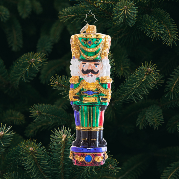 Ornament Description - Three Nutty Knights: Three heads are better than one! Hang up this trusty trio of nutcracker soldiers and relax knowing you'll have not one, not two, but three pairs of watchful eyes over your tree, primed to defend it from any Rat King intruders!