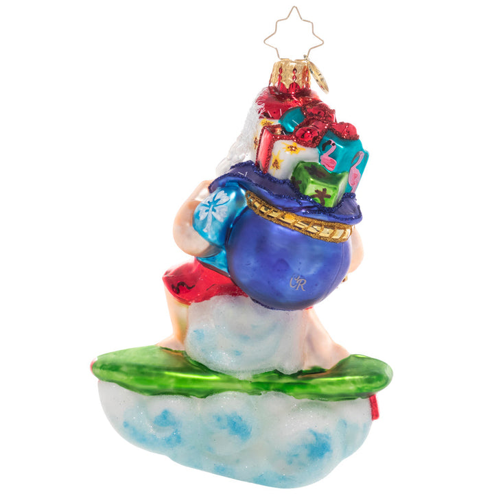Back - Ornament Description - Surf's Up Santa: Cowabunga, dude! Santa hangs ten and surfs to shore to make sure all the beach babies out there get their presents too!