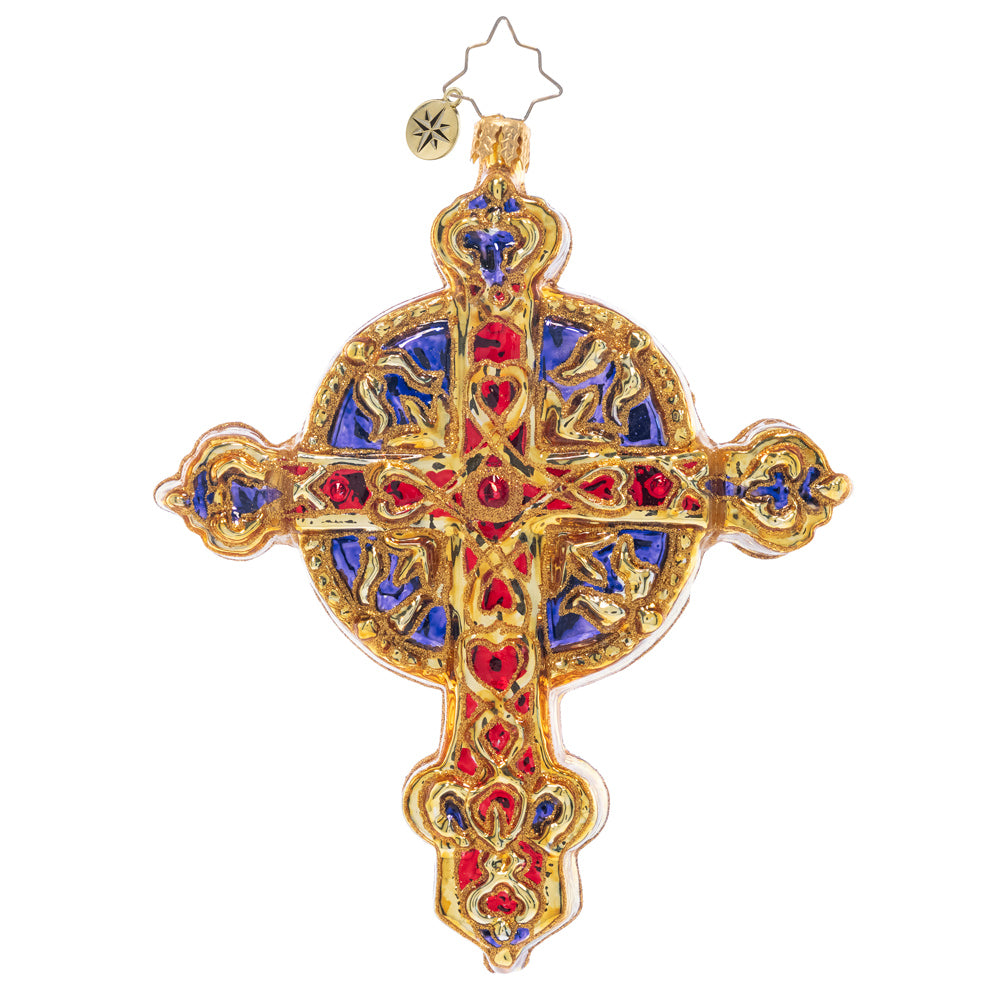 Back - Ornament Description - Radiant Guiding Light: This gleaming golden cross features the beautiful scene of baby Jesus, Mary, and Joseph – a piece that celebrates the beauty of Christmas.