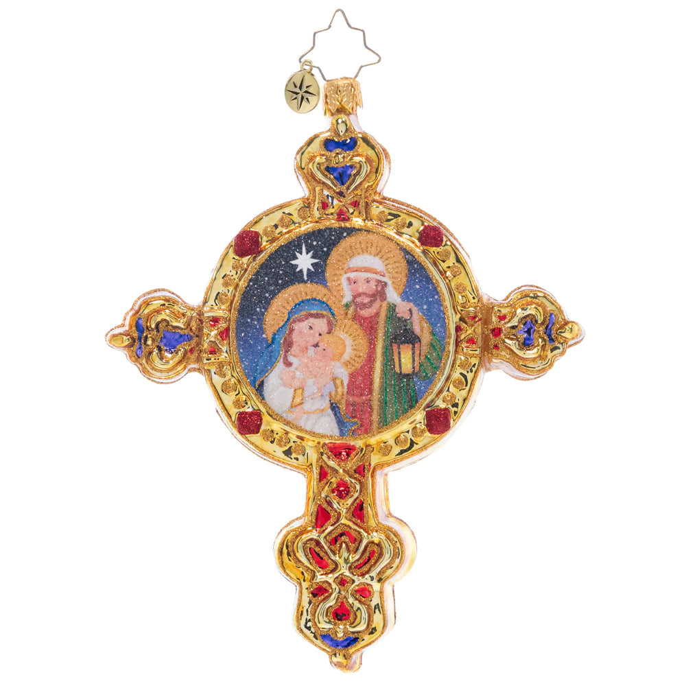 Front - Ornament Description - Radiant Guiding Light: This gleaming golden cross features the beautiful scene of baby Jesus, Mary, and Joseph – a piece that celebrates the beauty of Christmas.