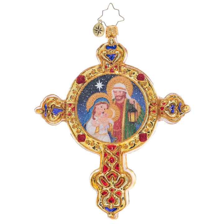 Front - Ornament Description - Radiant Guiding Light: This gleaming golden cross features the beautiful scene of baby Jesus, Mary, and Joseph – a piece that celebrates the beauty of Christmas.