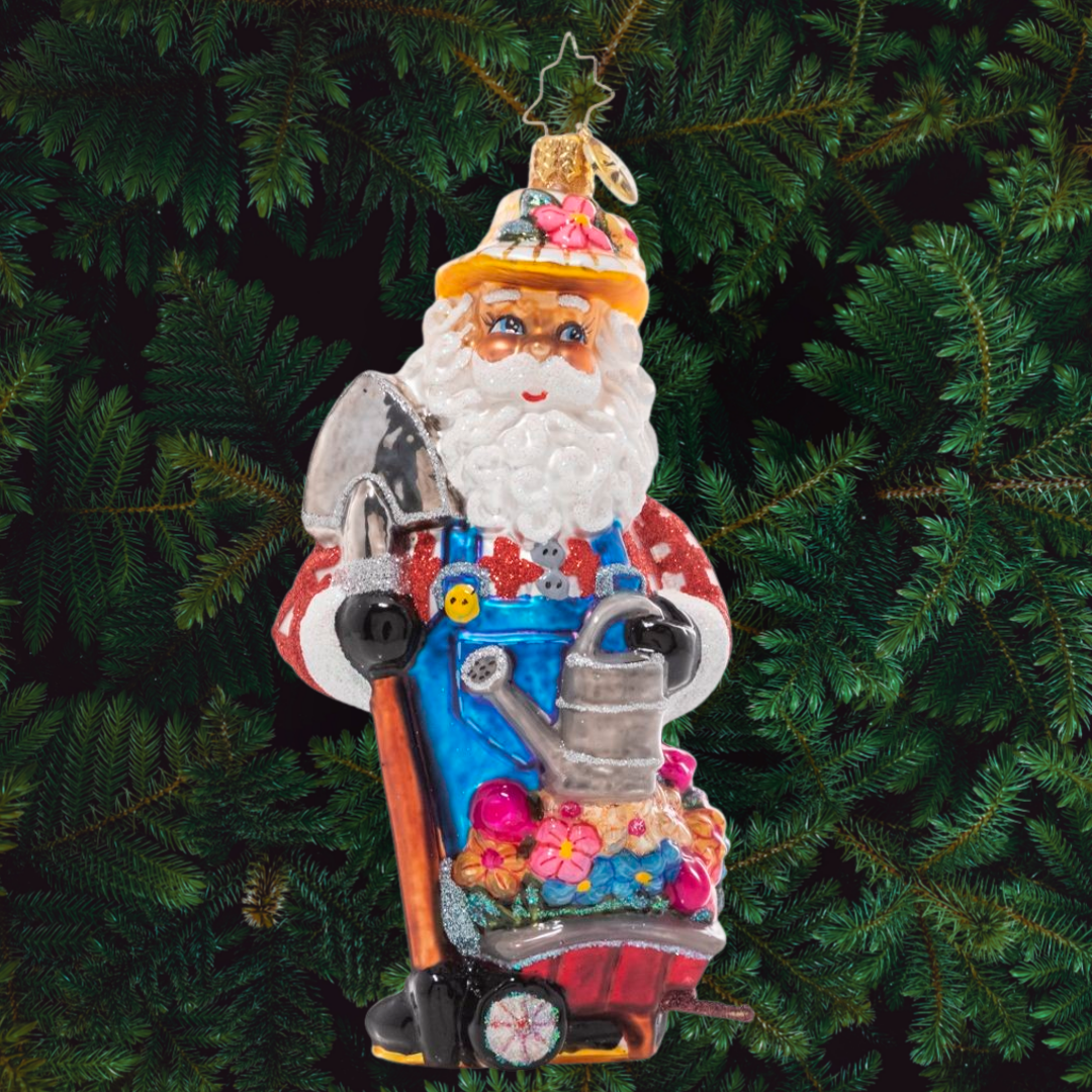 Ornament Description - Santa's Garden: Christmas might be Santa's favorite season, but Spring is definitely a close second! After lovingly tending to his flower patch for weeks and weeks, he stands proudly with his blooming garden bounty, ready to share with friends.