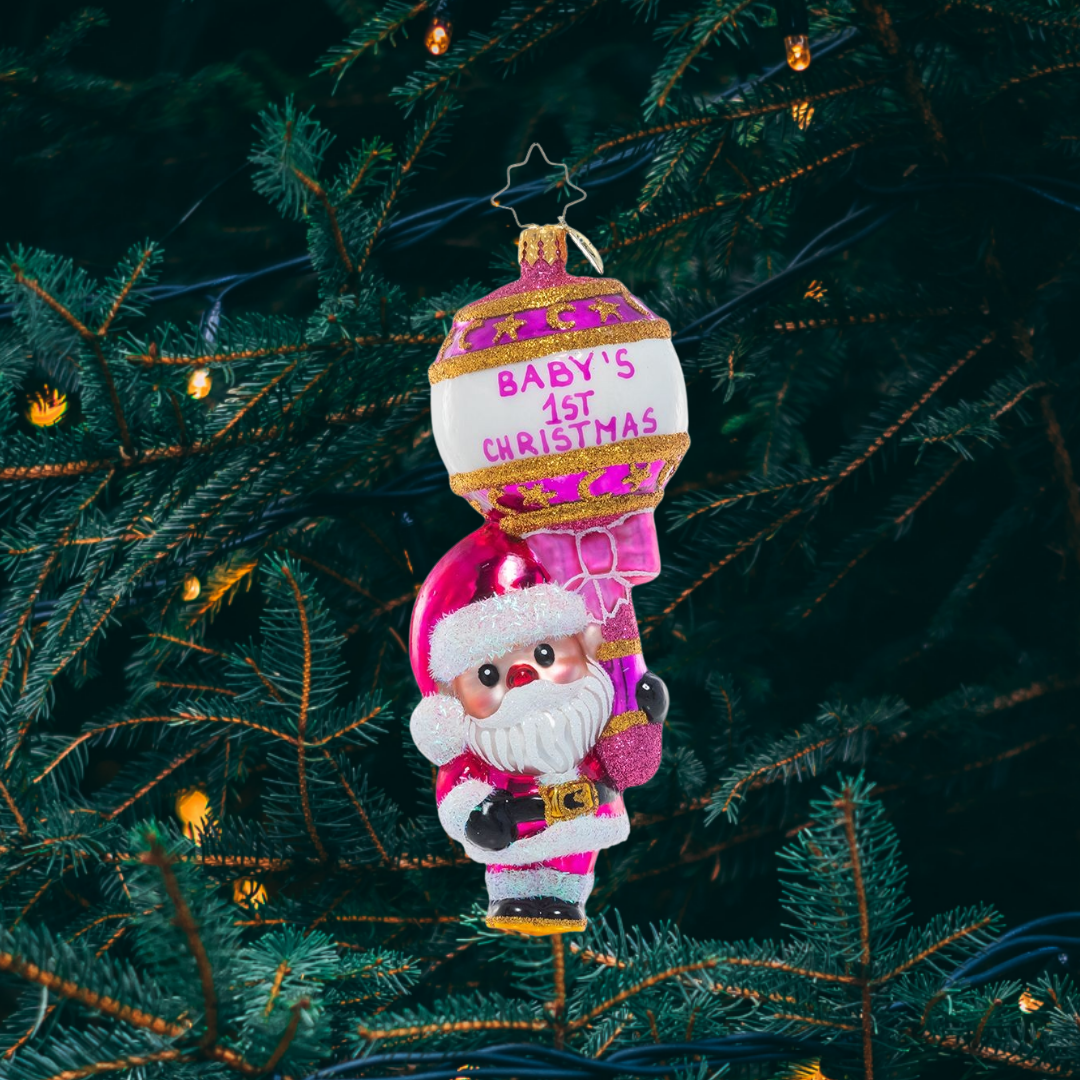 Ornament Description - First Christmas Rattle: Pretty in Pink: It's a girl! Celebrate baby's first Christmas with this special Santa keepsake ornament.