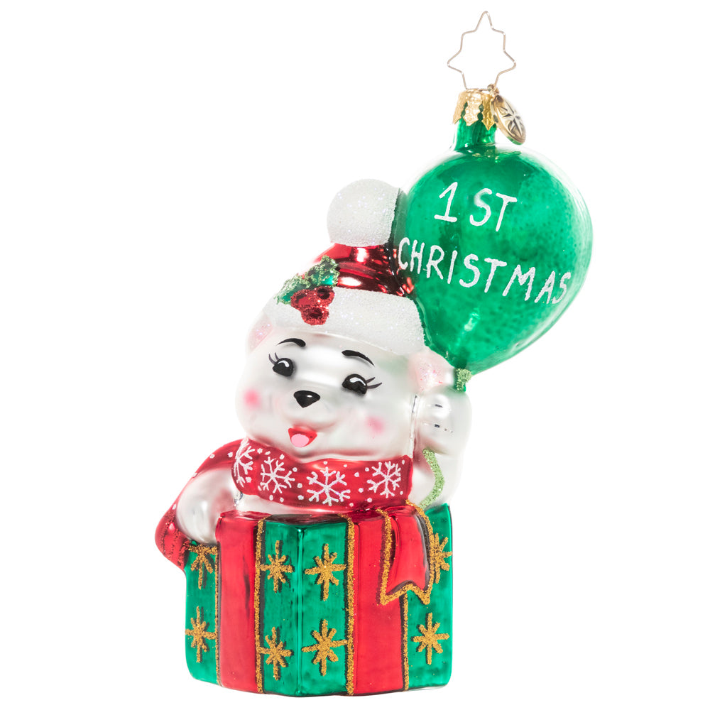 Ornament Description - Baby Bear's 1st Christmas: This baby bear is peeking out of a gift box, ready to share a cheerful message – Happy 1st Christmas to the new arrival in your life!