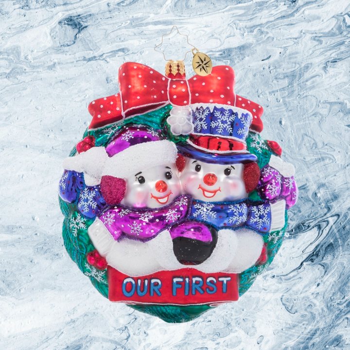 Ornament Description - Snowy First Christmas: Love – and snowflakes! – are in the air! Commemorate your first holiday season together with this adorable snow couple in love.