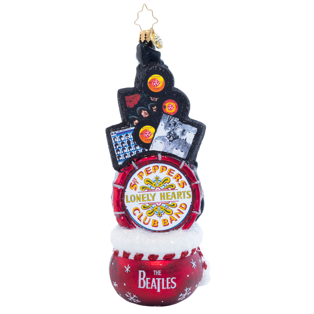 Ornament Description - Beatles Greatest Gifts: Looks like you've been extra good this year, so Santa has brought you a sack bursting with Beatles goodies. From Sgt. Pepper's drum to your favorite Beatles albums-- it's every Beatle collector's dream.