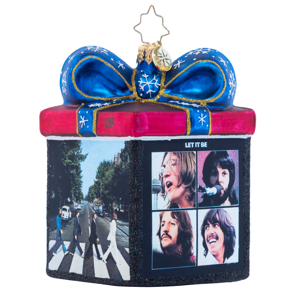 Back - Ornament Description - The Gift of The Beatles: Now this is our kind of music box! Featuring the cover art for four of the Beatles' later albums, this dazzling gift box ornament is the ideal addition to any fan's collection.