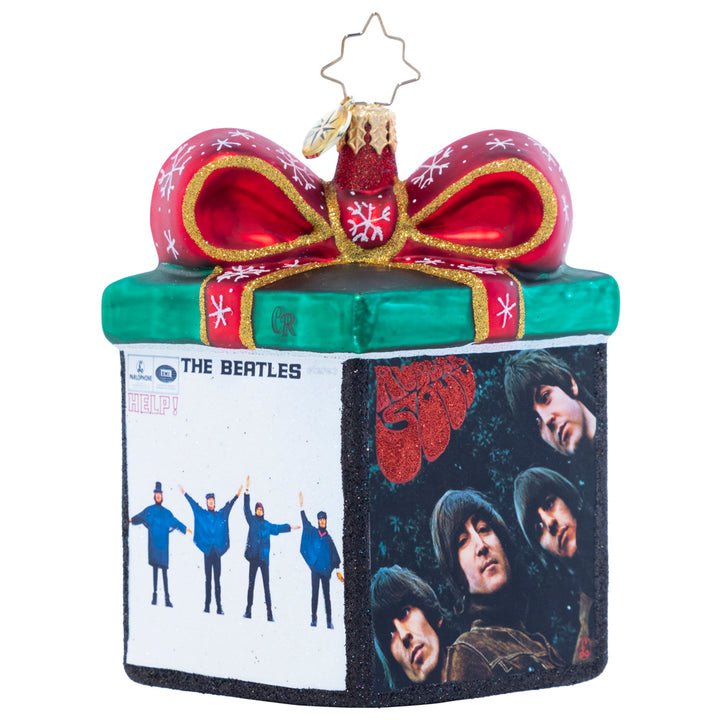 Back - Ornament Description - Boxed Up Bundles: Tied up with a sparkling bow, this miniature gift box highlights four of The Beatles' iconic albums. Let this piece inspire you to play one as you decorate your tree!
