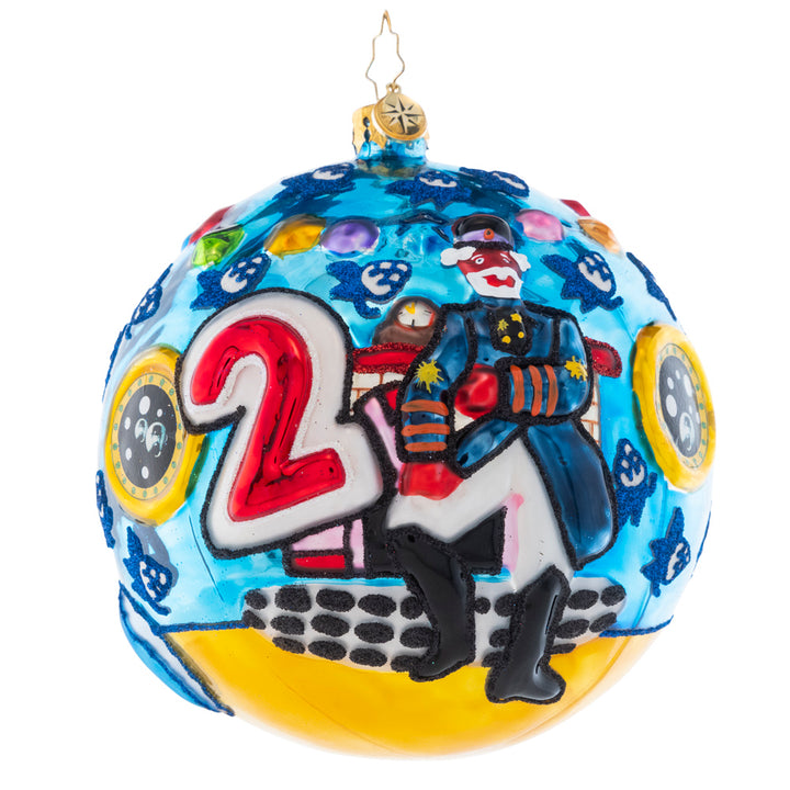 Ornament Description - Christmas on the Sub: Sgt Pepper is hosting a Christmas Party below sea level and you're invited! This round captures a festive holiday scene featuring some familiar faces from Pepperland.