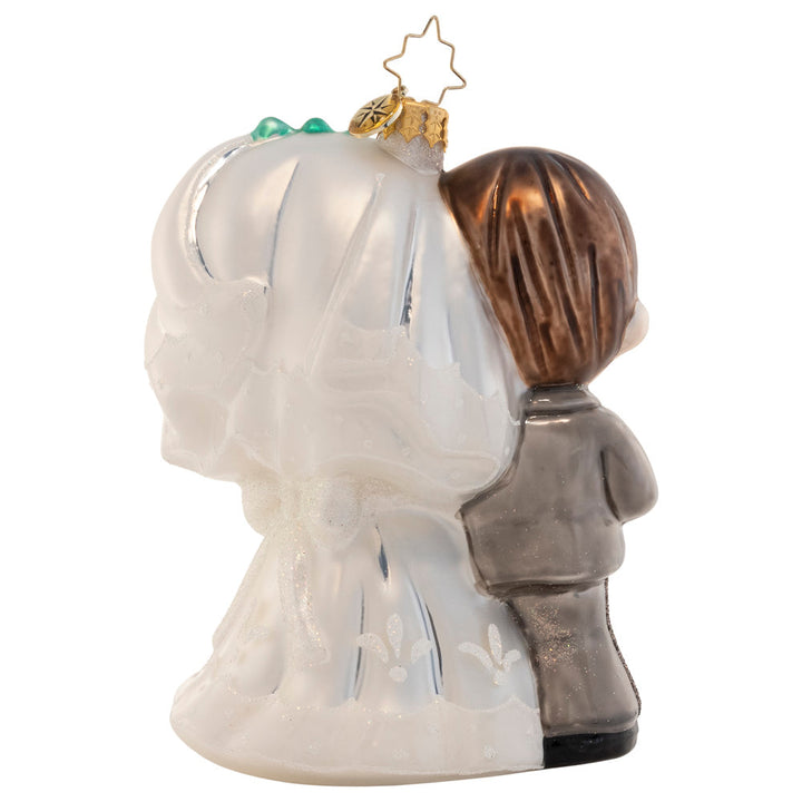 Back - Ornament Description - Precious Newlyweds: They do! Celebrate the happy couple in your life with this darling bride and groom. The perfect addition to your Precious Moments collection, this keepsake piece evokes the sweetness of love and the beginning of a new life together.