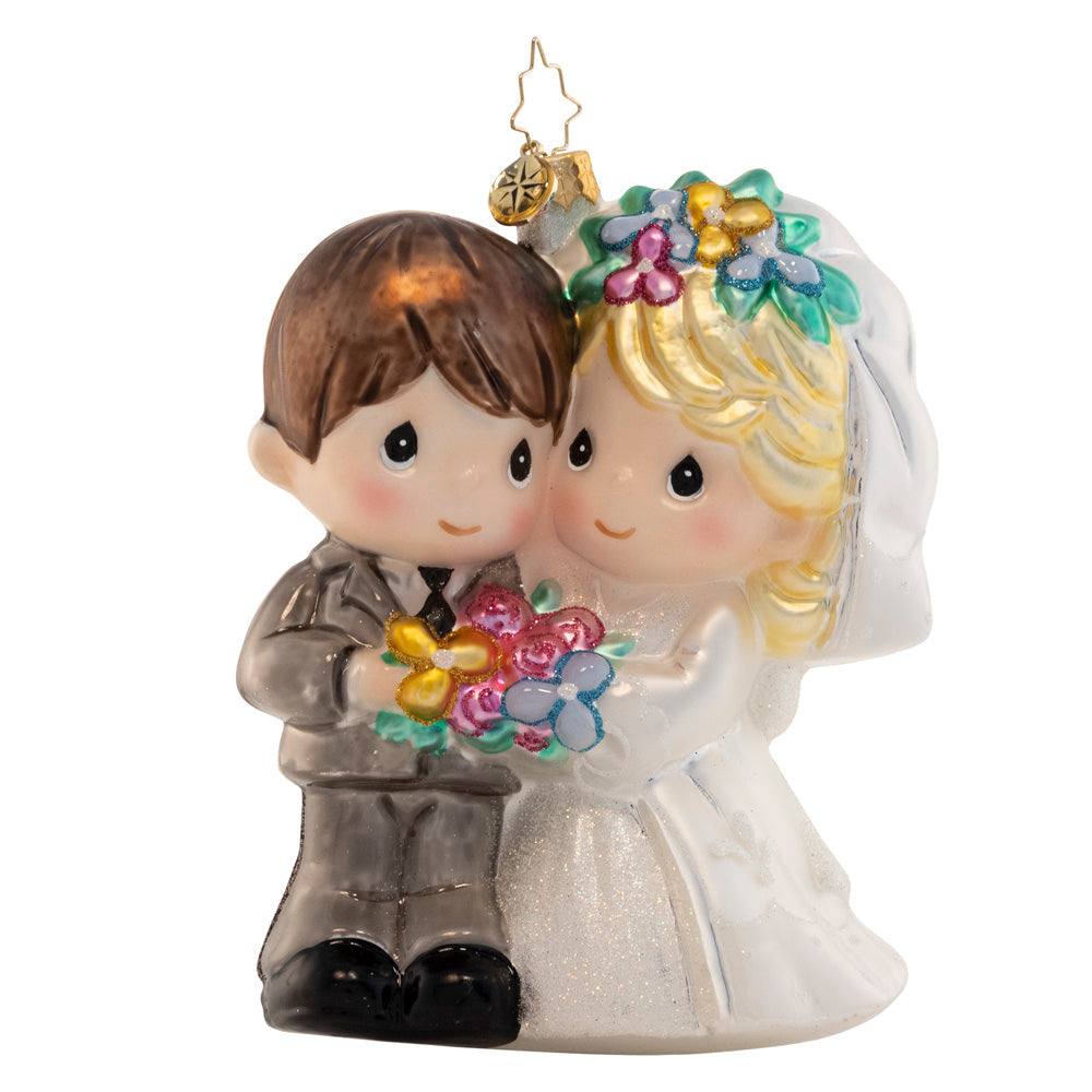 Ornament Description - Precious Newlyweds: They do! Celebrate the happy couple in your life with this darling bride and groom. The perfect addition to your Precious Moments collection, this keepsake piece evokes the sweetness of love and the beginning of a new life together.