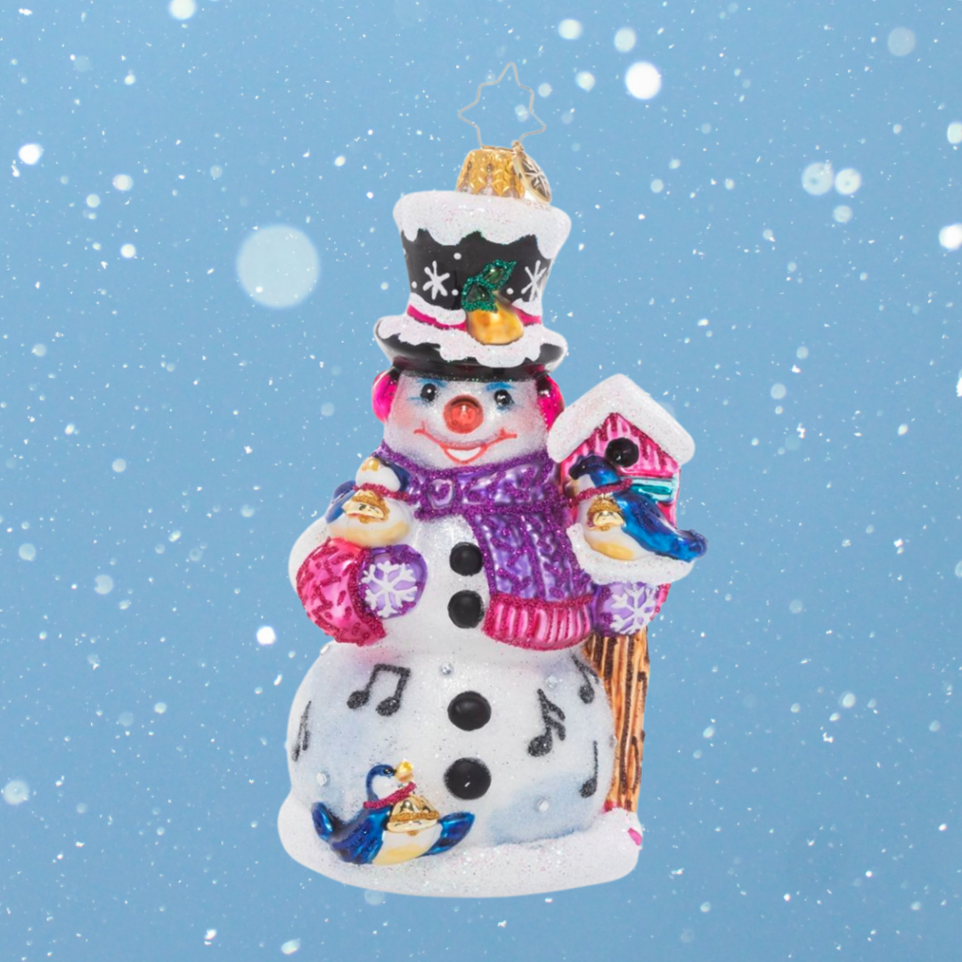 Ornament Description - Christmas Birdsong: The fourth piece in our Ornament of the Month collection celebrates the fourth day of Christmas. Cheerful calling birds surround our smiling snowman friend in sweet birdsong on a snowy winter morning. The best way to start the day!