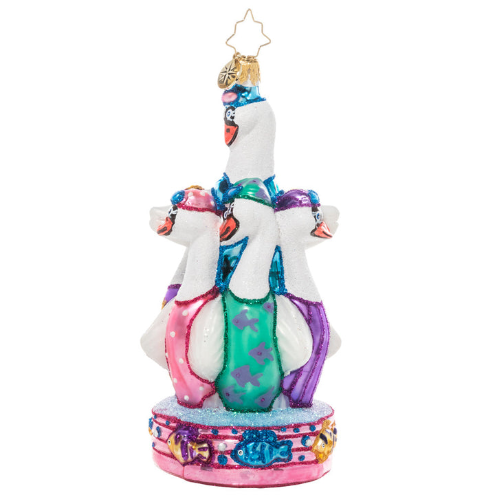 Side View - Ornament Description - Seven Synchronized Swans: On the seventh day of Christmas, my true love gave to me…seven swans a swimming! These fancy feathered friends don their caps and goggles in preparation for their holiday synchronized swimming showcase.