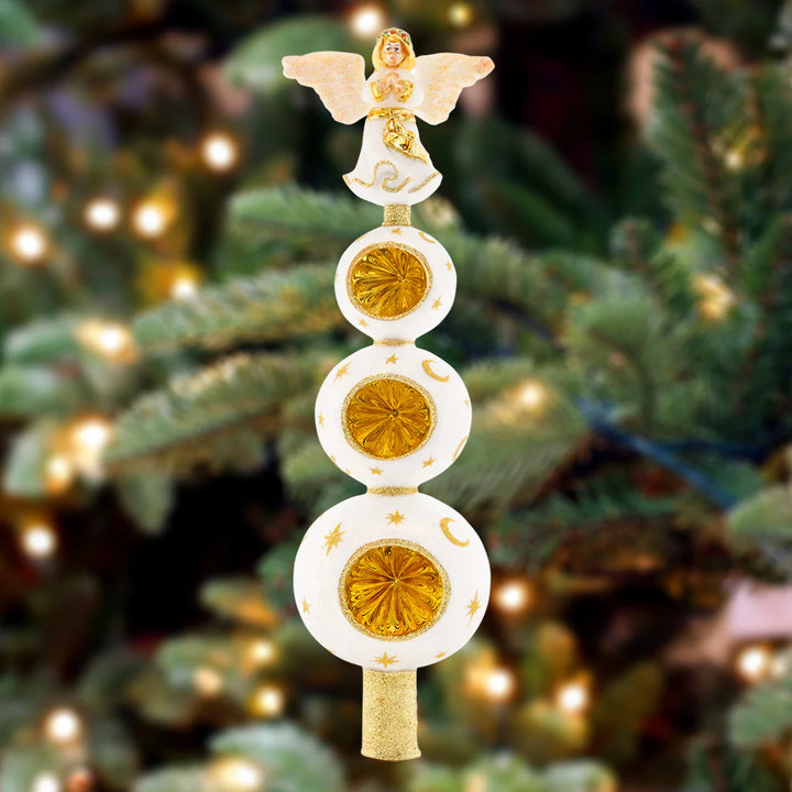 Finial Description - Heavenly Finial: With a glorious angel atop golden reflector rounds, this unique finial points to the Heavens and celebrates the true meaning of Christmas. Top your tree with this traditional yet stunning piece.