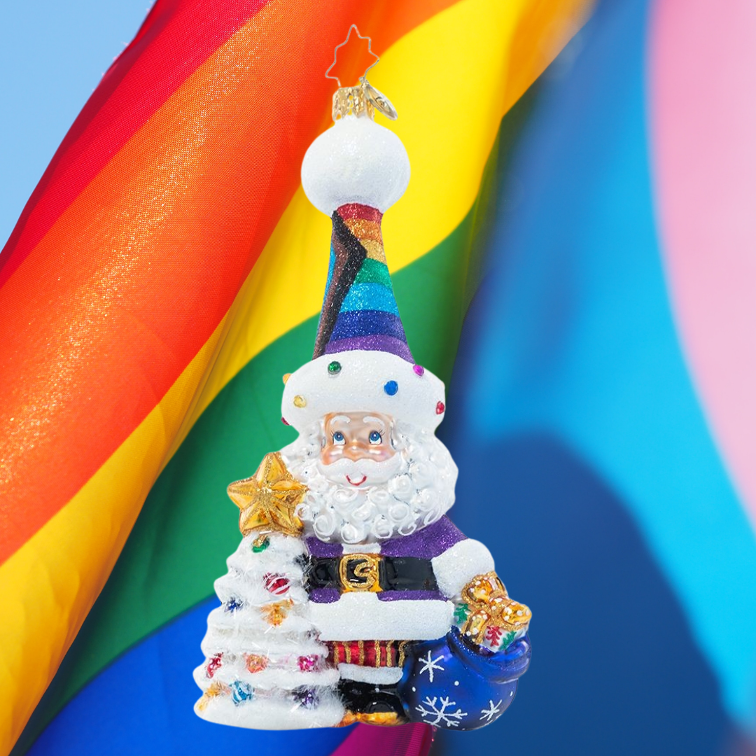 Ornament Description - Love is Love Santa: Santa's heart doesn't discriminate! He's happy to show his support for the LGBTQ+ community with his PRIDE-inspired festive wear in every color of the rainbow. A percentage of the sales from this ornament will benefit LGBTQ+ charities.