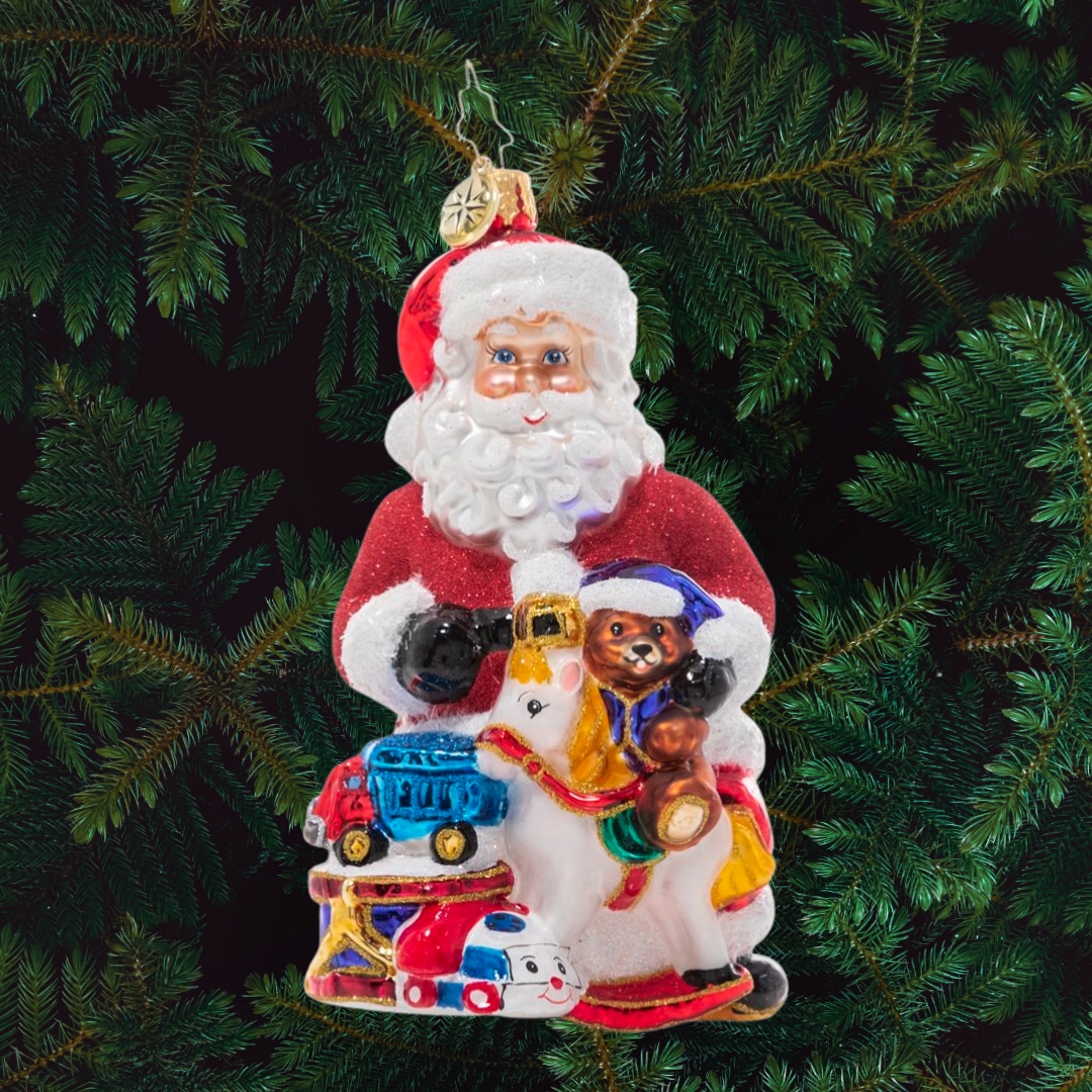 Ornament Description - Santa's Ton Of Toys: Santa looks perfectly prepared with his massive pile of toys for good little girls and boys! This traditional Santa is sure to delight!
