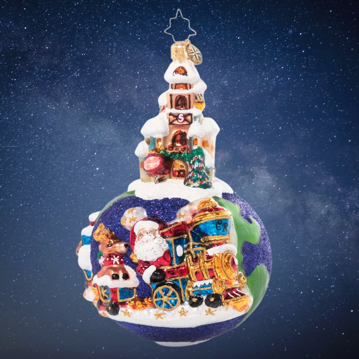 Ornament Description - Worldwide Train Ride: Choo choo! Christmastime is here! Santa has taken a break from flying through the sky to enjoy some time on land-traveling by train.