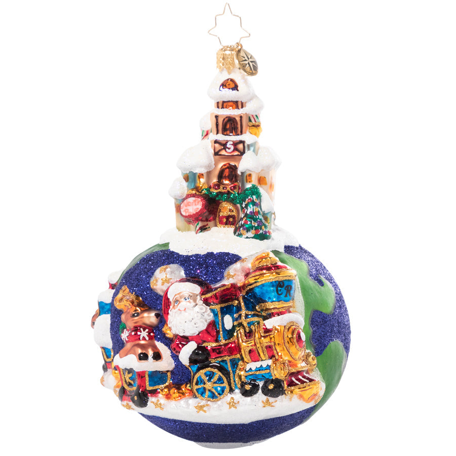 Front - Ornament Description - Worldwide Train Ride: Choo choo! Christmastime is here! Santa has taken a break from flying through the sky to enjoy some time on land-traveling by train.