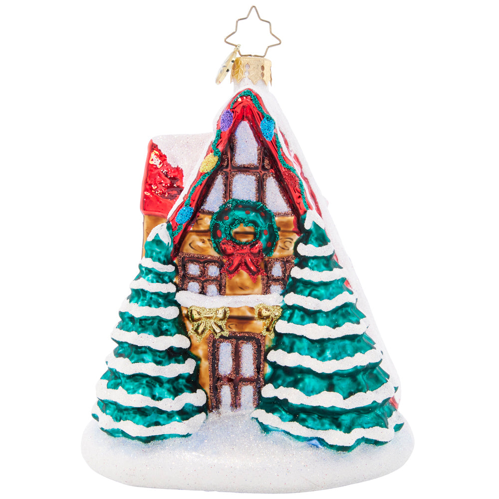 Back - Ornament Description - Alpine A-Frame: Mr. and Mrs. Claus are enjoying a much-needed ski vacation at their cozy alpine lodge. What a sweet winter getaway for the jolly couple!