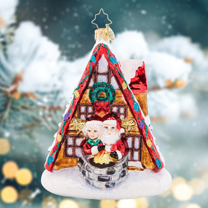 Ornament Description - Alpine A-Frame: Mr. and Mrs. Claus are enjoying a much-needed ski vacation at their cozy alpine lodge. What a sweet winter getaway for the jolly couple!