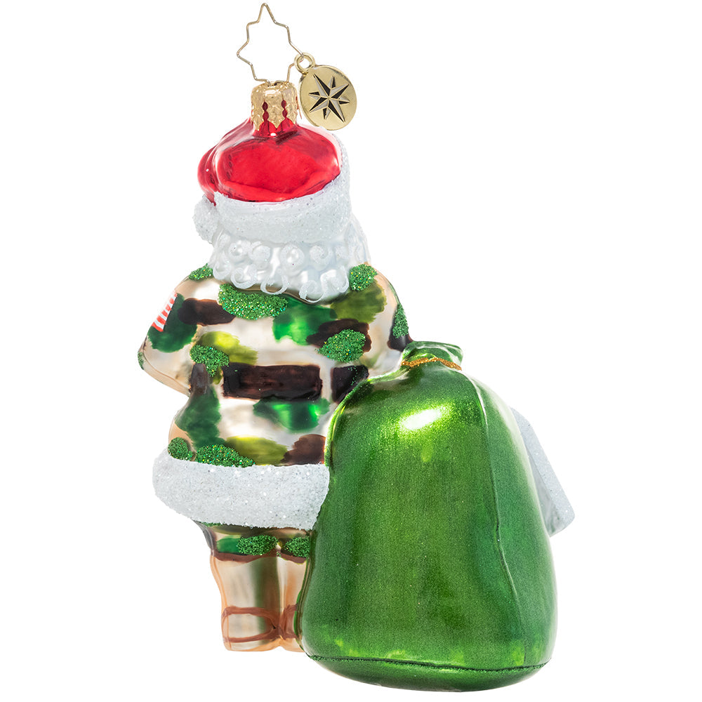 Back - Ornament Description - Camo Christmas Santa: Santa has returned from serving his country, and ready to serve the world on Christmas Eve. He's repurposed his military duffel to haul around his gifting loot!