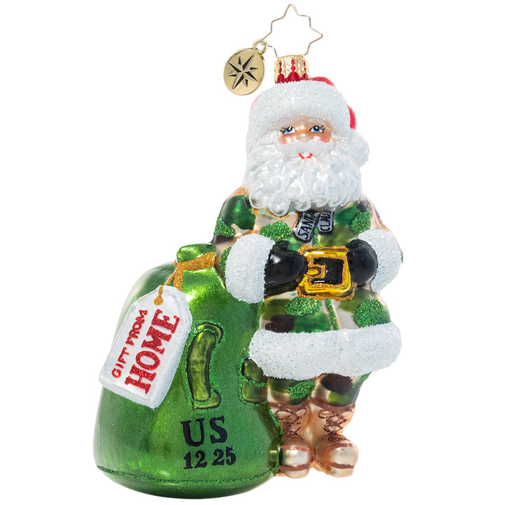 Ornament Description - Camo Christmas Santa: Santa has returned from serving his country, and ready to serve the world on Christmas Eve. He's repurposed his military duffel to haul around his gifting loot!