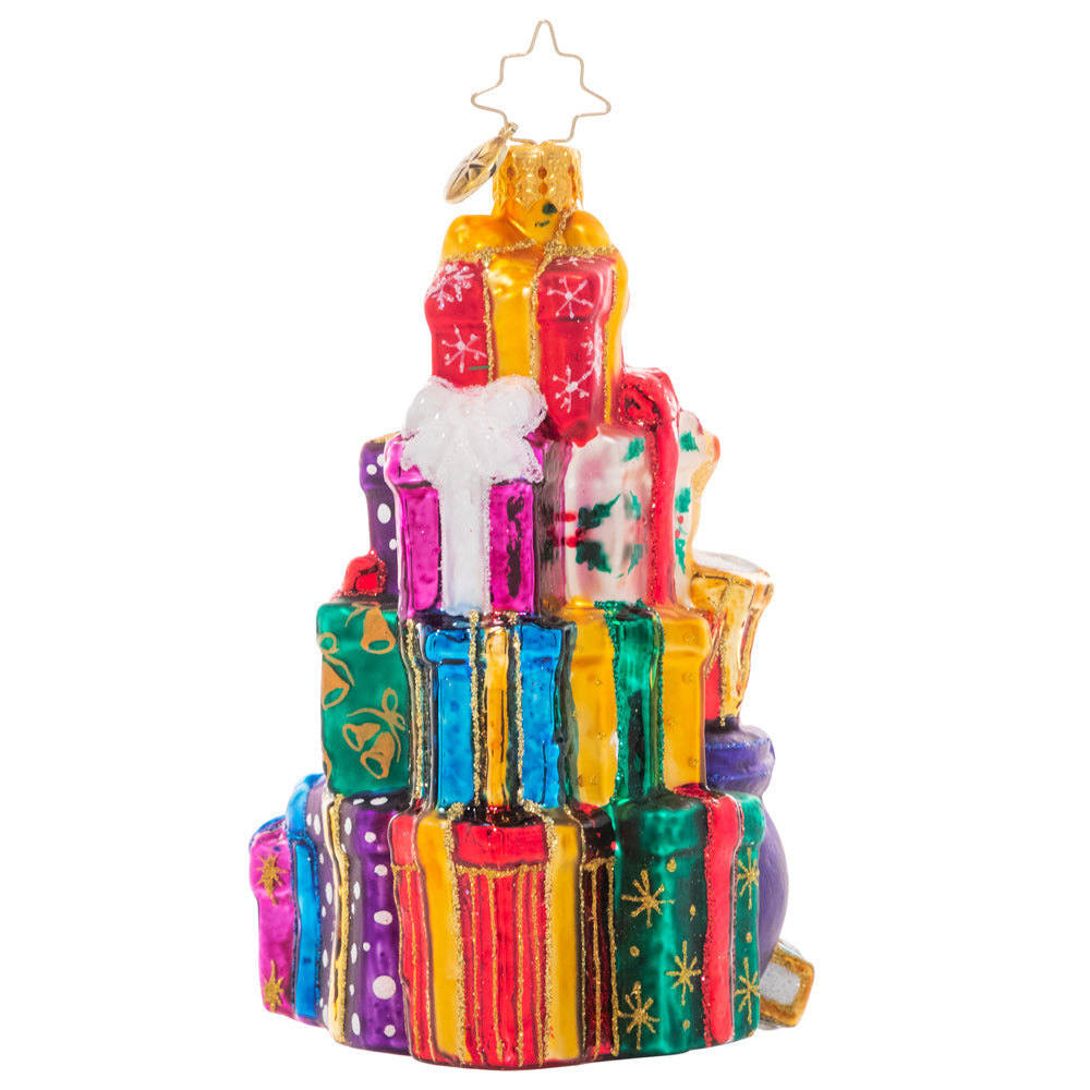 Back - Ornament Description - Stacked Up Surprises: Someone has been extra good this year! This towering pile of colorful presents is full of surprises for lucky little girls and boys.