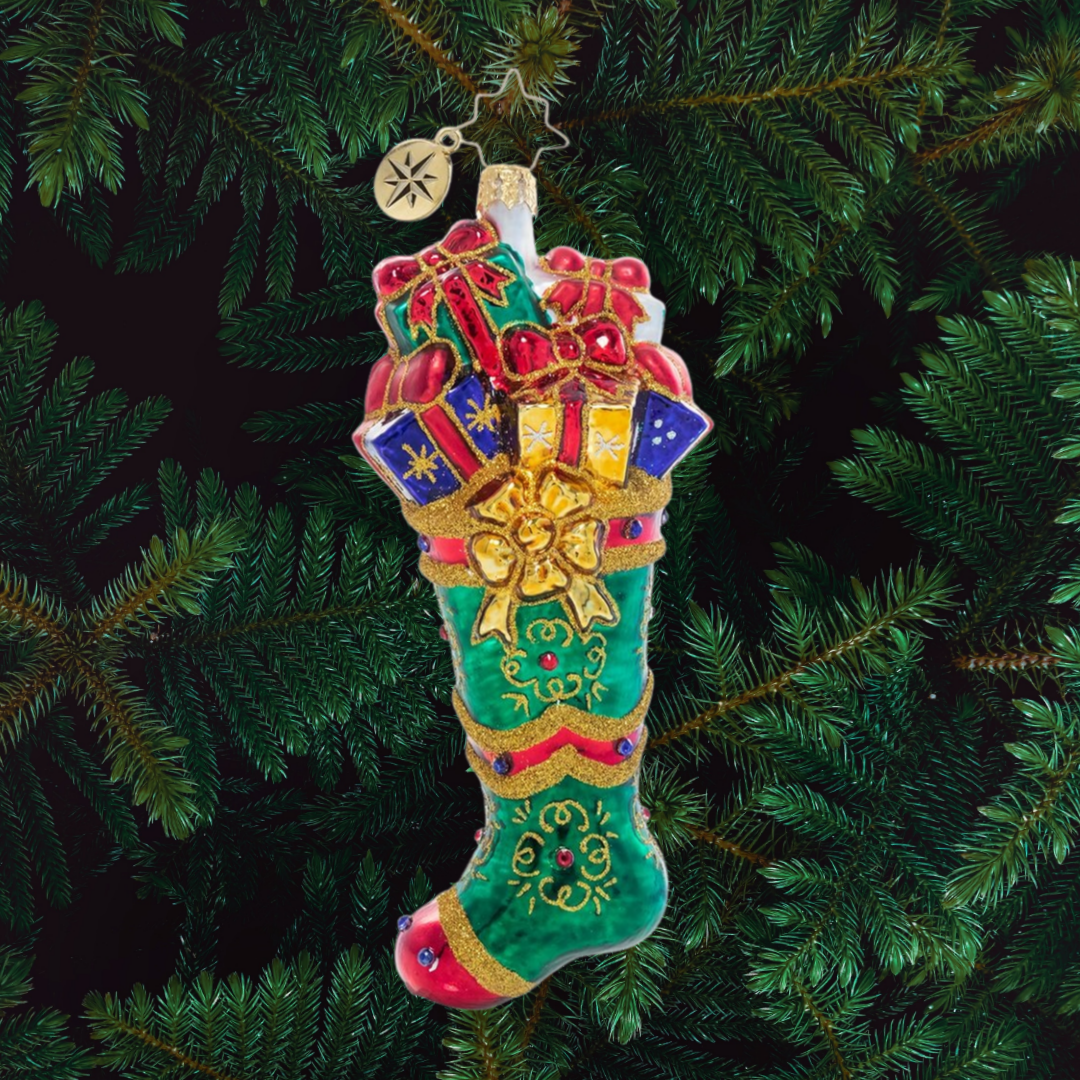 Ornament Description - Splendid Stocking: Someone has been extra good this year! An emerald green stocking has been stuffed full of goodies to delight and thrill on Christmas morning.