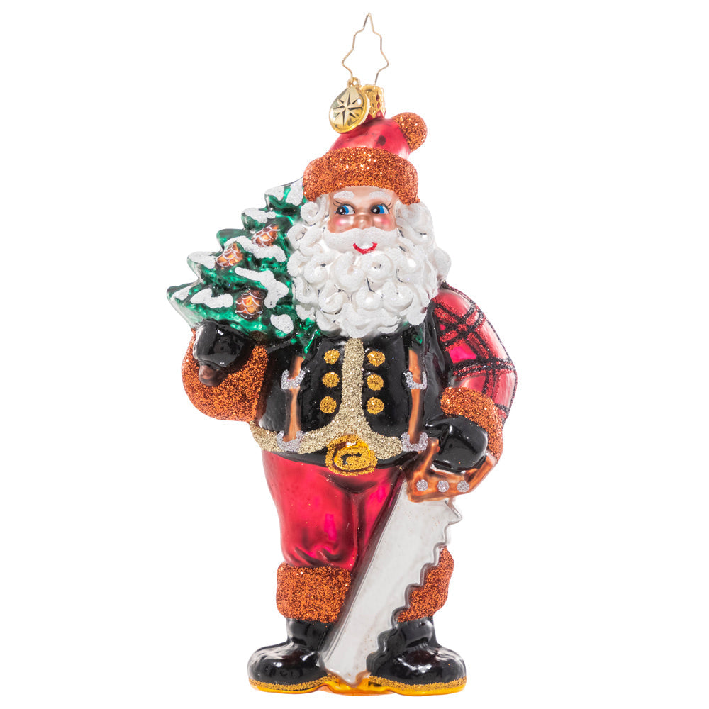 Front - Ornament Description - Winter Woodsman Santa: Santa has spent all day trekking through the snowy North Pole woods in search of the perfect Christmas tree for the Claus household…and he's finally found the one! He poses proudly with his selection slung over his shoulder. Now it's time to decorate!