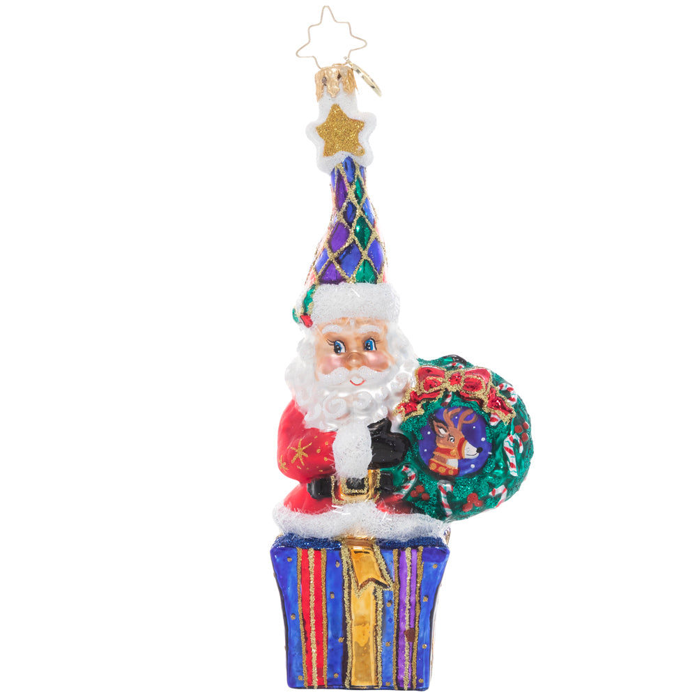 Front - Ornament Description - Marry & Bright Santa: Outfitted in cheery Christmas colors, this Santa is dressed to celebrate the season. He's holding hope for a wonderful holiday and a peaceful new year for us all!