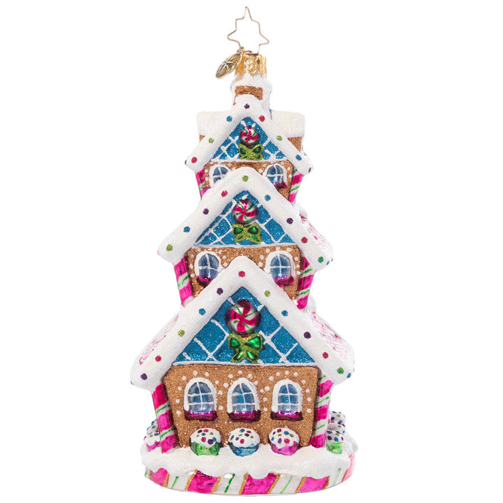 Back - Ornament Description - Sweetest Highrise: This charming tri-level treat is triple the fun! Covered in Christmas candies and icing snow drifts, this charming gingerbread cottage shows off some of what makes this season so very sweet.