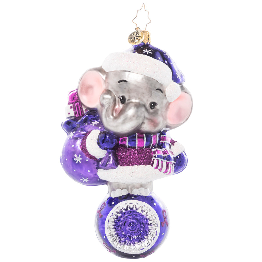 Front - Ornament Description - Love Never Forgets: With big ears and an even bigger heart, an adorable elephant dons all his purple duds in honor of Alzheimer's Awareness. After all, an elephant never forgets, and he wants us to remember this important cause too! A percentage of the sales from this ornament will benefit Alzheimer's charities.